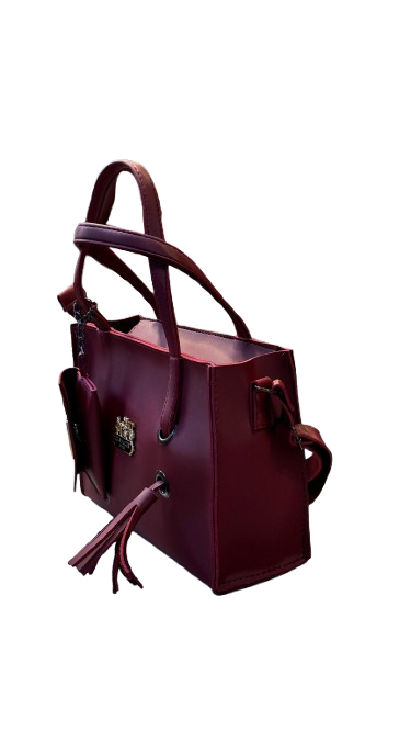 "Burgundy Coach Handbag with Gold Accents 👜💅"