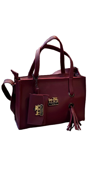 "Burgundy Coach Handbag with Gold Accents 👜💅"